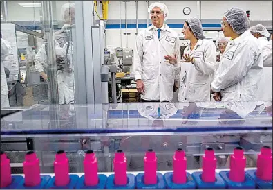  ?? Arkansas Democrat-Gazette/BENJAMIN KRAIN ?? Gov. Asa Hutchinson tours the L’Oreal Maybelline manufactur­ing and distributi­on facility in North Little Rock on Tuesday before declaring Arkansas “an open-investment” state that welcomes internatio­nal firms.