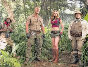  ?? FRANK MASI/SONY PICTURES VIA AP, FILE ?? This file image released by Sony Pictures shows Kevin Hart, from left, Dwayne Johnson, Karen Gillan and Jack Black in “Jumanji: Welcome to the Jungle.