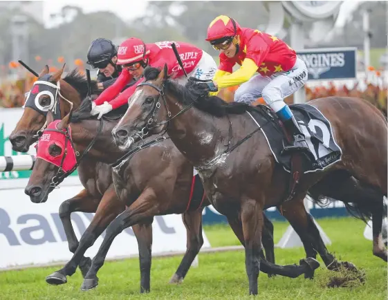  ??  ?? Kerrin McEvoy wins on Russian Revolution (right) in the Group 1 The Galaxy at Rosehill during the Sydney autumn carnival. Picture: AAP IMAGE