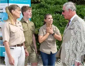  ?? ?? Prince Charles met Terri, Robert and Bindi Irwin three years ago when he toured the Reef.