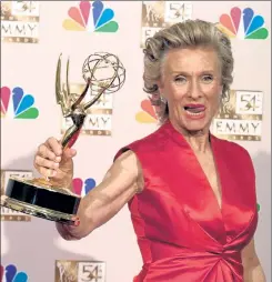  ?? LEE CELANO / GETTY IMAGES ?? Actress Cloris Leachman holds her Emmy which she won for Outstandin­g Guest Actress in a Comedy Series for her appearance on ‘Malcolm in the Middle’ at the 54th Annual Emmy Awards in Los Angeles in September 2002.