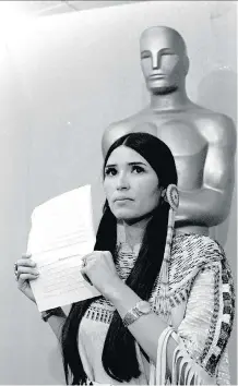  ?? PHOTOS: THE ASSOCIATED PRESS/FILES ?? Sacheen Littlefeat­her caused a stir in 1973 when she told the Academy Awards audience that Marlon Brando was declining to accept his Oscar as best actor for his role in The Godfather to protest Hollywood’s treatment of Native Americans.