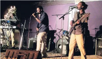  ??  ?? Members of the Raging Fyah band in performanc­e