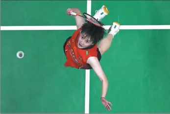  ?? AFP ?? China’s Chen Yufei returns to South Korea’s An Se-young during the Uber Cup final in Bangkok on Saturday. Chen won her singles match but China slumped to a 3-2 defeat.