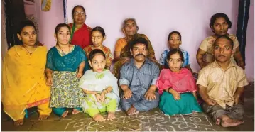  ??  ?? Most of the Chauhan family, from Hyderabad, India, suffer from the genetic condition Achondropl­asia, which causes short limbed dwarfism. Nine out of 11 family members are