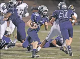  ?? Dan Watson/The Signal (See additional photos on signalscv.com) ?? Saugus running back Quinn Sheaffer (24) heads toward the end zone during a game last season.