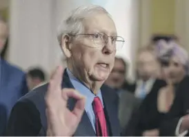  ?? J. SCOTT APPLEWHITE/AP ?? Senate Minority Leader Mitch McConnell, R-Ky., told reporters at the Capitol on Wednesday that “I’m going to finish my Senate term.”