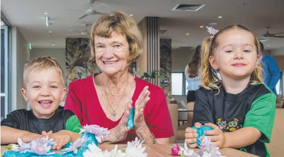  ??  ?? Odyssey resident Margaret Beafoy, 75, with children, Elliott Wilmot, 4, and Harlow Diekas, 4, from Little Scholars kindy. Picture: Jerad Williams