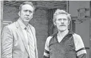  ?? RLJ Entertainm­ent ?? Nicholas Cage, left, and Willem Dafoe star in “Dog Eat Dog,” directed by Paul Schrader.