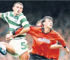 ?? ?? Duncan Ferguson jousts with Tony Mowbray on the day Dundee United last won at Celtic Park