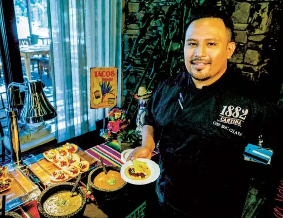  ?? WATCHARA PHOMICINDA THE PRESS-ENTERPRISE/SCNG ?? Chef Eric Celaya of 1882 Cantina shows off his beef cheek tacos for the Tacos & Tequila Festival at Pechanga Resort Casino.