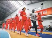  ?? PROVIDED TO CHINA DAILY ?? Eliud Kipchoge joins China’s national long–distance running team during a training session in Beijing on Thursday.