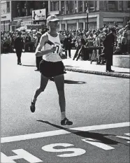  ?? AP FILE PHOTO ?? Ambrose J. Burfoot of Groton crosses the finish line to win the 72nd annual Boston Marathon on April 19, 1968. Burfoot, a Wesleyan University senior at the time, covered the 26 miles and 385 yards in 2:22:17.