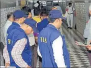  ?? HT FILE ?? A team of the NIA inspects the Uttar Pradesh Assembly in Lucknow, At present, only the agency automatica­lly has concurrent jurisdicti­on over cases of suspected terrorism.