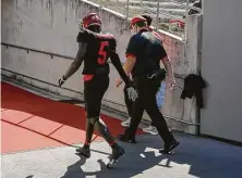  ?? Godofredo A. Vásquez / Staff photograph­er ?? Receiver Marquez Stevenson leaves last week’s game against UCF with an ankle injury that will sideline him Saturday as well.