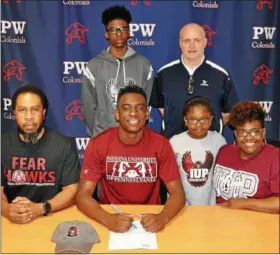  ?? SUBMITTED PHOTO ?? Plymouth Whitemarsh High School (PWHS) senior Alan Glover has signed a letter of intent to play basketball at Indiana University of Pennsylvan­ia next season. Pictured: Front row (l to r): Don Matthews, Alan Glover, Bryn Matthews and Jimica Douglas....