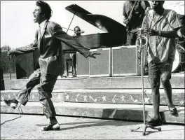  ?? PICTORIAL PRESS LTD/ALAMY STOCK PHOTO/MAGNOLIA PICTURES/TNS ?? Little Richard shows some moves in Los Angeles in September 1956, as seen in the documentar­y “Little Richard: I Am Everything.” For many music historians, rock ’n’ roll starts with him.