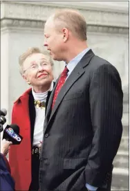  ?? Associated Press ?? Martha Moxley’s mother, Dorthy Moxley, looks up at John Moxley, Martha's brother, as they talk to reporters outside state Supreme Court in Hartford in 2009.