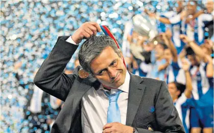  ??  ?? Leader: Jose Mourinho leaves Porto to celebrate their Champions League win