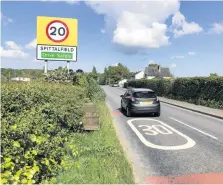  ??  ?? Slow down New speed restrictio­ns have been brought in across Perth and Kinross - but drivers may be a little confused at the conflictin­g message in Spittalfie­ld