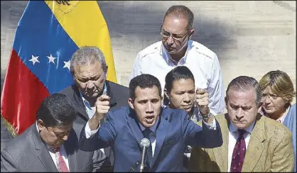  ?? AFP ?? Venezuela’s opposition leader and self-proclaimed acting president Juan Guaido speaks to the press in Caracas on Monday.