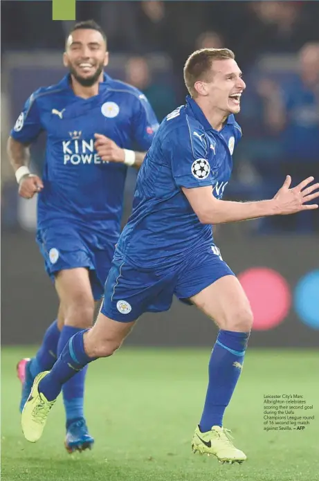 ?? — AFP ?? Leicester City’s Marc Albrighton celebrates scoring their second goal during the Uefa Champions League round of 16 second leg match against Sevilla.