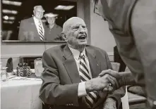  ?? Brett Coomer / Staff photograph­er ?? Former players savored an opportunit­y to help Bill Yeoman celebrates his 92nd birthday in December.