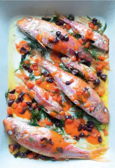  ??  ?? BAKED RED MULLET WITH TOMATO, OLIVE AND
DILL VINAIGRETT­E
Quick and easy, yet packing serious wow factor, you can pop this in the oven and join your guests outside.
F&T WINE MATCH
Crisp, white and citrus fruits and floral notes (eg 2015 Garzón...