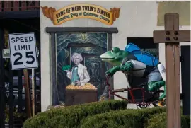  ??  ?? Above: A mural of Mark Twain is painted on the wall of the former Angels Hotel in Angels Camp, where bullfrogs are revered throughout town in pop art. Mark Twain first heard the tale of the jumping frogs of Calaveras County in the hotel's bar back in the 1860s.