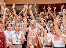  ?? ANI ?? Students and teachers celebrate after the announceme­nt of the CISCE Class 10 results at a school in Gurugram.