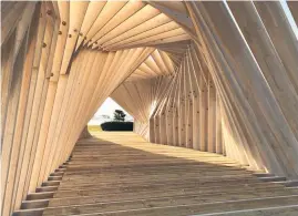  ??  ?? Stevens Lawson Architects designed the wooden-ribbed pavilion at Waiheke.