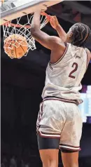  ?? RICK OSENTOSKI/USA TODAY SPORTS ?? Former Texas Southern forward Davon Barnes dunks the ball in the first half against Fairleigh Dickinson at UD Arena in Dayton on March 15 2023.
