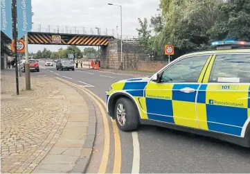  ??  ?? SCENE: The low rail bridge in Tay Street, Perth, damaged by the HGV.