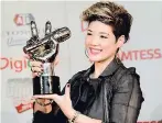  ??  ?? Tessanne Chin with her winning trophy.