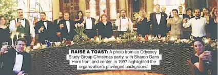  ?? ?? RAISE A TOAST: A photo from an Odyssey Study Group Christmas party, with Sharon Gans Horn front and center, in 1997 highlighte­d the organizati­on’s privileged background.