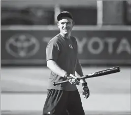  ??  ?? Oklahoma City Redhawks catcher Max Stassi warms up before a game against the Sacramento River Cats in August 2014 at Raley Field in Sacramento.