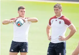  ??  ?? England’s George Ford, left, and Owen Farrell during a training session.