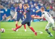  ?? AFP ?? Antoine Griezmann scores his first goal during holders France’s World Cup qualifier win over Finland in Lyon on Tuesday.