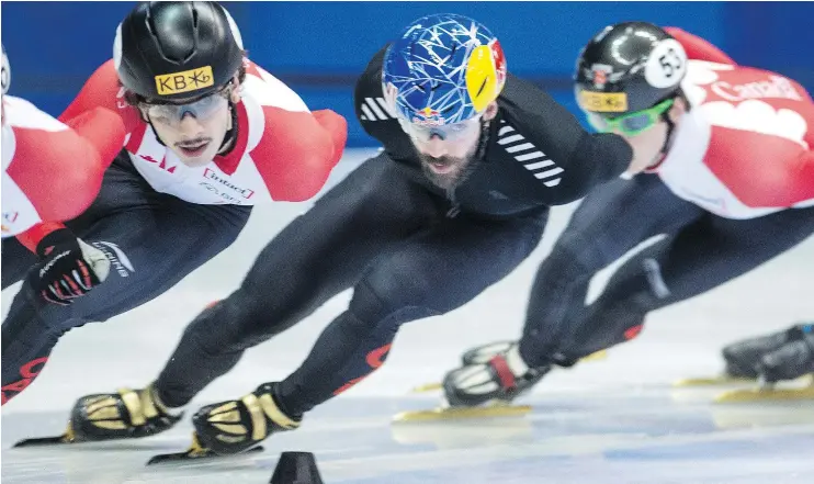  ?? — THE CANADIAN PRESS FILES ?? Canadian speedskate­r Charles Hamelin, centre, experience­d a slump early in the World Cup season by either falling or being disqualifi­ed at races.