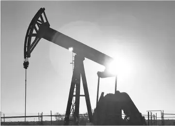  ?? — Reuters photo ?? An oil pump is seen operating in the Permian Basin near Midland, Texas, US. US oil traders are hoping the sweltering days of July are also hot ones for demand, believing the new month is the last best opportunit­y this year to see the overhang of...