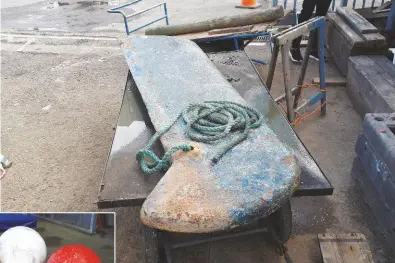  ??  ?? RIGHT Recovered to dry land, the keel safely in the boatyard