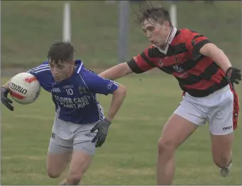  ??  ?? Cillian Buttimer, Kilbrin, seeks out an opening against Newmarket in the Duhallow JBFC at Lismire. Photo by John Tarrant