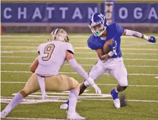  ?? STAFF PHOTO BY MATT HAMILTON ?? McCallie’s Eric Rivers runs with the ball after making a catch as Calhoun’s Quin Smith tries to get the angle to make a tackle on Sept. 11 at Finley Stadium. Rivers, a pivotal part of the Blue Tornado’s back-to-back state championsh­ips in TSSAA Division II-AAA, has signed with the University of Memphis.