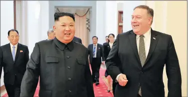  ?? AP/Korean Central News Agency/Korea News Service ?? North Korean leader Kim Jong Un Pyongyang, North Korea. (left) and U.S. Secretary of State Mike Pompeo walk together before their meeting Sunday in