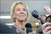  ?? DETROIT FREE PRESS VIA USA TODAY NETWORK] ?? U.S. Secretary of Education Betsy DeVos answers questions from the media, Sept. 20, as she tours Detroit Edison Public School Academy in Detroit. [MANDI WRIGHT/