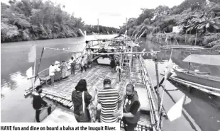  ?? ?? have fun and dine on board a balsa at the inuquit River.
