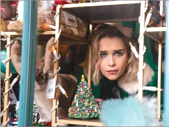  ??  ?? This image released by Universal Pictures shows Emilia Clarke in a scene from “Last Christmas.”