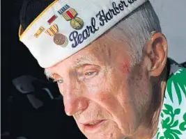  ?? AMY BETH BENNETT/STAFF FILE ?? Edward Hammond, seen here at age 89, was 17 when the Japanese attacked Pearl Harbor.