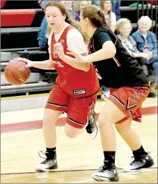  ?? PHOTO BY RICK PECK ?? Mattie Leach drives past a defender during the Lady Mustangs’ Mustang Pride Day scrimmage on Friday night at MCHS.