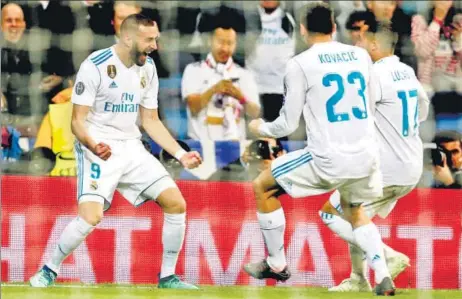  ??  ?? ▪ Real Madrid's Karim Benzema (left) celebrates his second goal against Bayern Munich with teammates Mateo Kovacic and Lucas Vazquez on Tuesday.